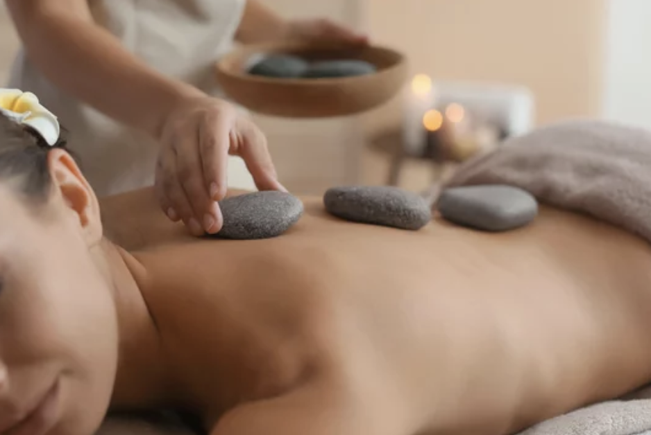 lady getting hot stone massage